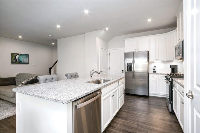 7005 Augusta Ln, Penn Twp Wml, PA 15644 - kitchen with stainless steel appliances, a sink, open floor plan, a kitchen island with sink, and dark wood finished floors