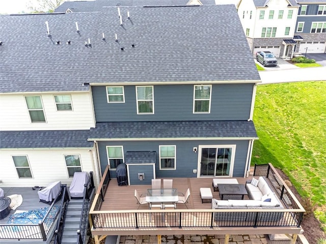 7005 Augusta Ln, Penn Twp Wml, PA 15644 - back of property with an outdoor living space, a wooden deck, and roof with shingles