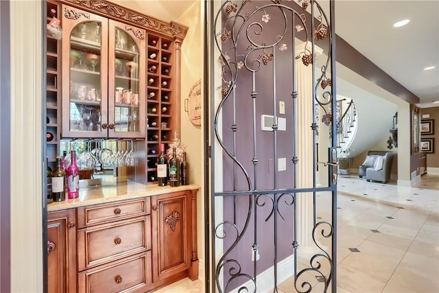107 Mirage Dr, Cranberry Twp, PA 16066 - wine cellar featuring a bar, light tile patterned flooring, baseboards, and recessed lighting