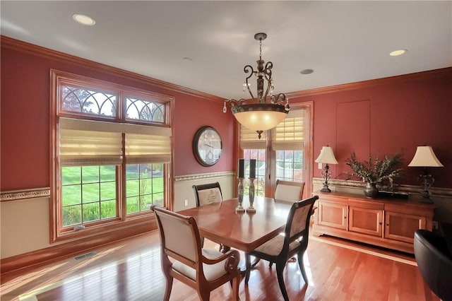 107 Mirage Dr, Cranberry Twp, PA 16066 - dining room featuring healthy amount of natural light, light wood finished floors, ornamental molding, and recessed lighting