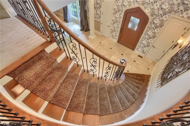 107 Mirage Dr, Cranberry Twp, PA 16066 - stairway with plenty of natural light and wallpapered walls
