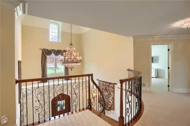 107 Mirage Dr, Cranberry Twp, PA 16066 - hallway with an upstairs landing, a chandelier, carpet floors, baseboards, and ornamental molding