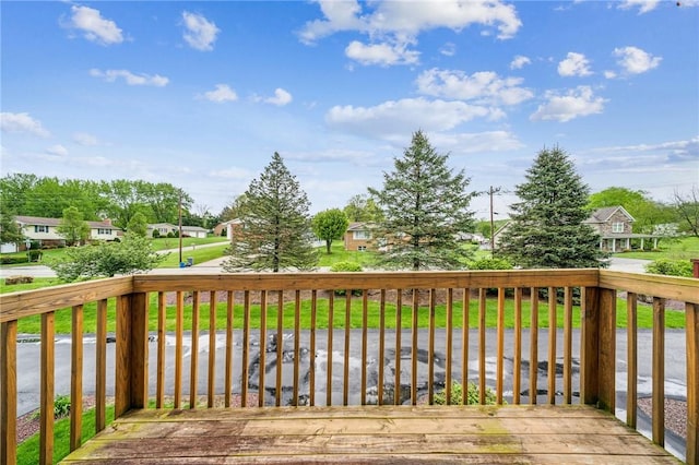 wooden deck with a residential view