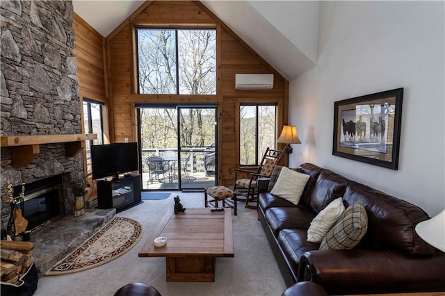 4308 Swiss Mountain Dr, Seven Springs Resort, PA 15622 - carpeted living area featuring a wall unit AC, wood walls, high vaulted ceiling, and a stone fireplace