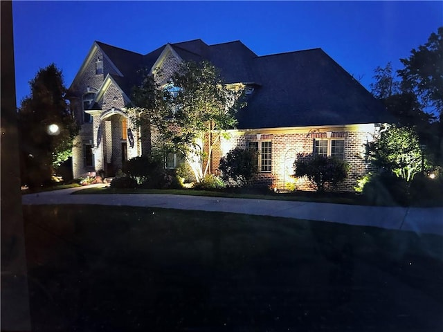 view of front of property with brick siding