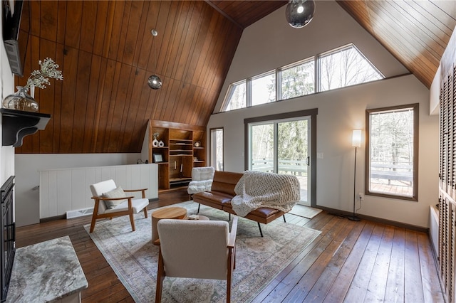 living area with wooden ceiling, high vaulted ceiling, hardwood / wood-style floors, and baseboards