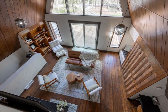 living room with stairway and hardwood / wood-style floors