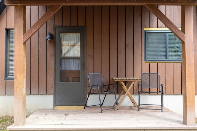 doorway to property with board and batten siding