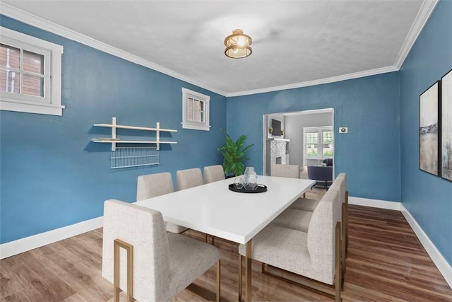 1140 N Negley Ave, Highland Park, PA 15206 - dining area featuring wood finished floors, baseboards, and ornamental molding