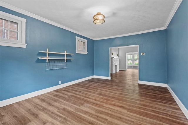 1140 N Negley Ave, Highland Park, PA 15206 - spare room with wood finished floors, baseboards, and ornamental molding