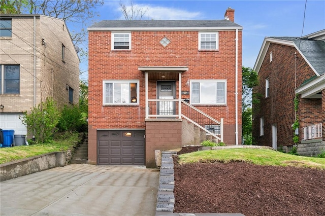 view of front of house with a garage, brick siding, concrete driveway, and a chimney