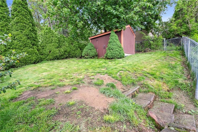 view of yard with a storage unit and an outdoor structure
