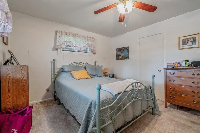 bedroom with carpet flooring and a ceiling fan