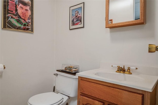 half bath with toilet and vanity