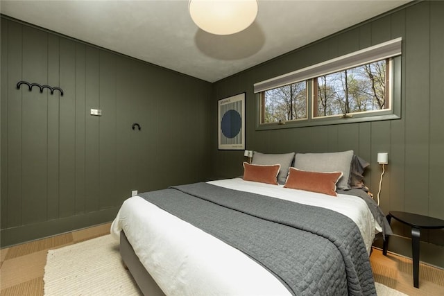 bedroom with a decorative wall