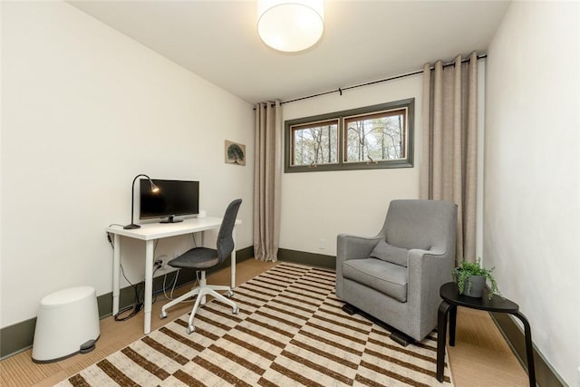 office area featuring baseboards
