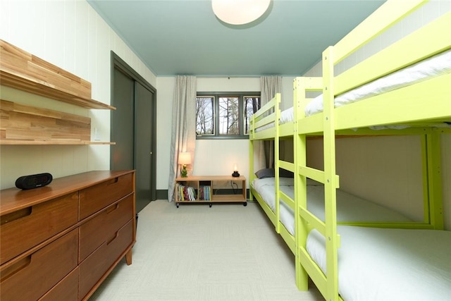 bedroom with light carpet