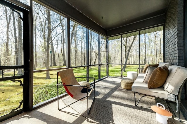 sunroom featuring healthy amount of natural light