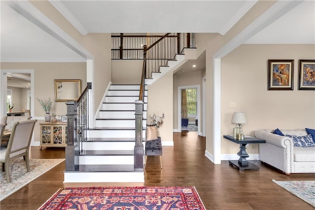 1765 Stevensan Dr, Franklin Park, PA 15143 - foyer entrance with stairs, wood finished floors, baseboards, and crown molding