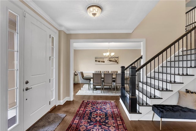 1765 Stevensan Dr, Franklin Park, PA 15143 - foyer featuring stairs, a chandelier, dark wood finished floors, crown molding, and baseboards