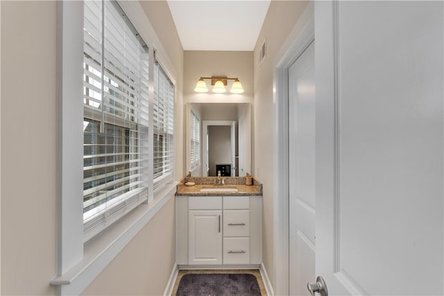 1765 Stevensan Dr, Franklin Park, PA 15143 - bathroom with vanity and baseboards