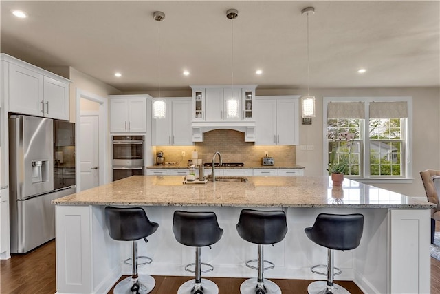 1765 Stevensan Dr, Franklin Park, PA 15143 - kitchen featuring stainless steel appliances, tasteful backsplash, white cabinets, a spacious island, and recessed lighting