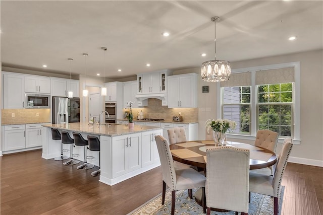 1765 Stevensan Dr, Franklin Park, PA 15143 - dining room with dark wood-type flooring, recessed lighting, a chandelier, and baseboards