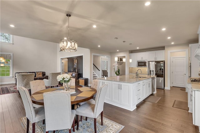 1765 Stevensan Dr, Franklin Park, PA 15143 - dining space featuring stairway, recessed lighting, dark wood-style flooring, baseboards, and a chandelier