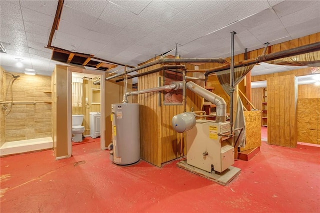 finished below grade area with water heater and wooden walls
