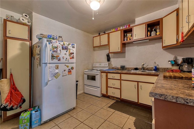 108 Pandora Dr, Derry Twp, PA 15627 - kitchen featuring white appliances, light tile patterned floors, a sink, open shelves, and dark countertops