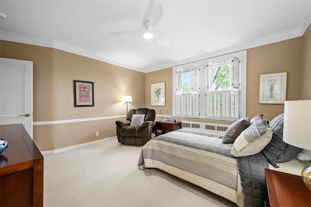 carpeted bedroom featuring crown molding, radiator heating unit, ceiling fan, and baseboards