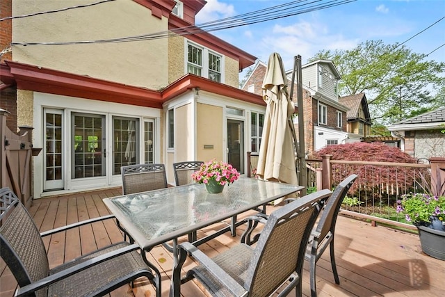 deck featuring outdoor dining area