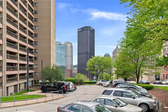 uncovered parking lot with a view of skyline