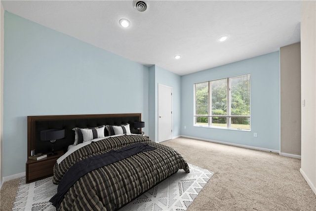 bedroom with carpet flooring, baseboards, and recessed lighting