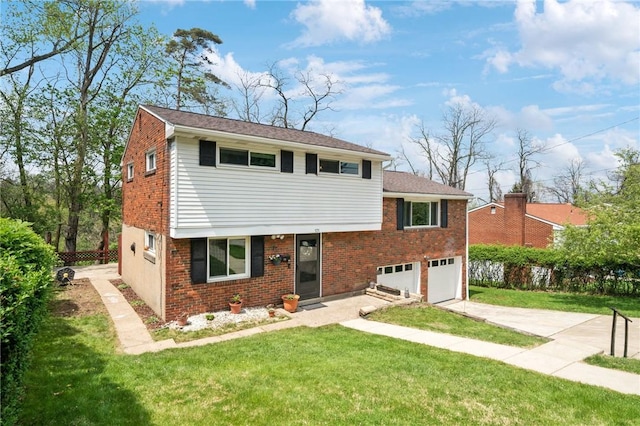 view of front of property featuring driveway, an attached garage, and brick siding