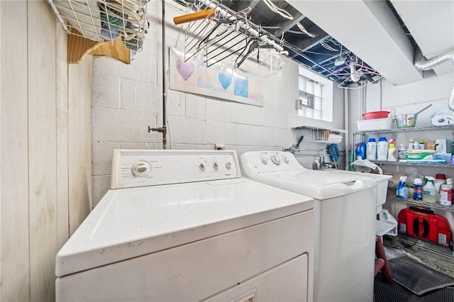 washroom with washing machine and dryer