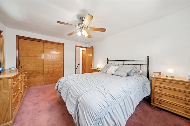 carpeted bedroom featuring a closet and ceiling fan