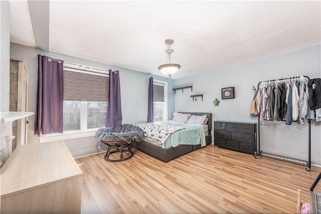bedroom with light wood-style flooring