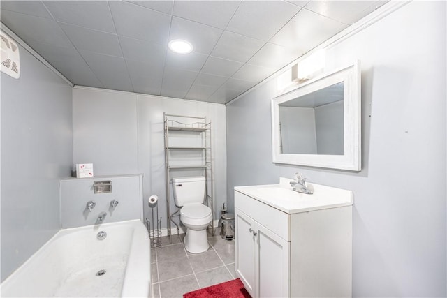 full bath featuring toilet, a tub, vanity, and tile patterned floors