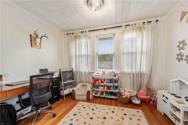 office area featuring ornamental molding and wood finished floors