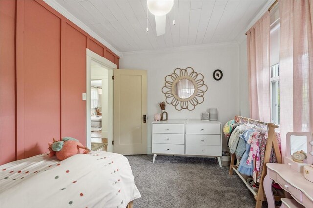 bedroom with crown molding, carpet flooring, and wooden ceiling