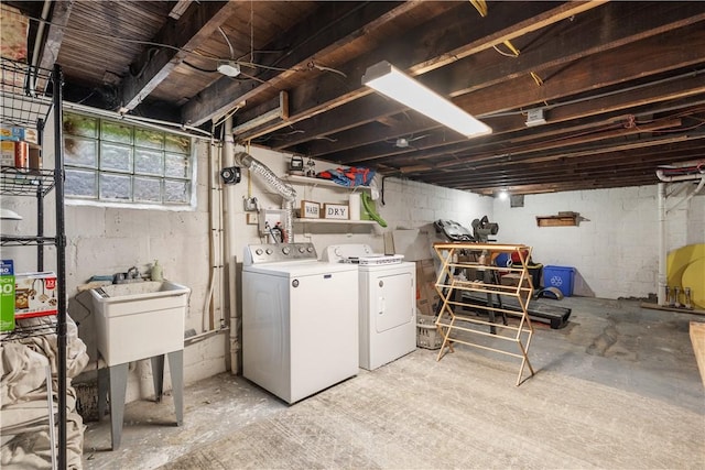 basement with washing machine and dryer