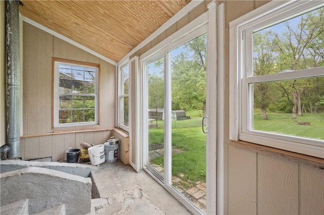 sunroom with wooden ceiling and lofted ceiling