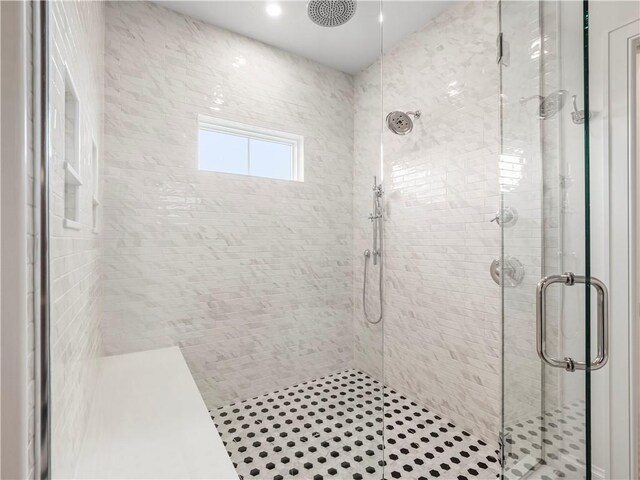bathroom featuring a stall shower