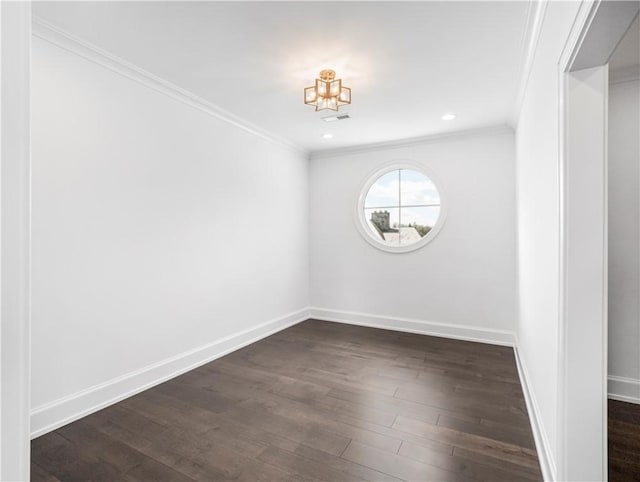 unfurnished room with a chandelier, ornamental molding, dark wood finished floors, baseboards, and recessed lighting