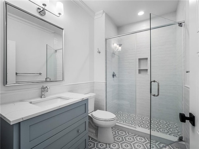 full bath featuring a stall shower, toilet, vanity, recessed lighting, and tile patterned floors