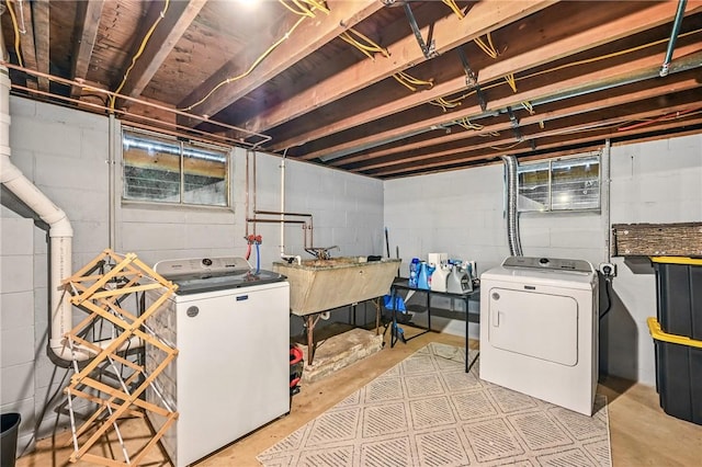 laundry area with washing machine and dryer