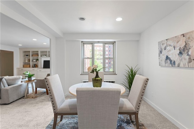 dining area featuring carpet, recessed lighting, baseboards, and built in shelves