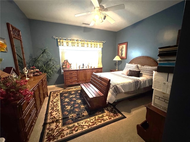 bedroom featuring carpet floors and a ceiling fan