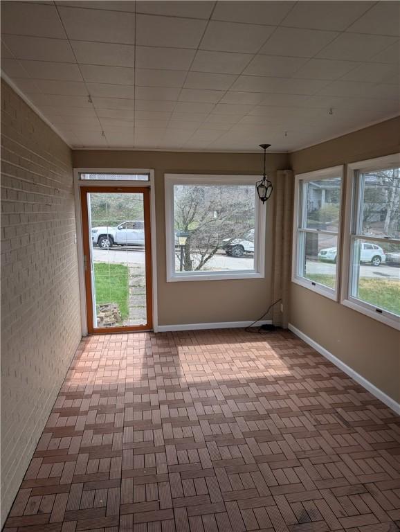 view of unfurnished sunroom